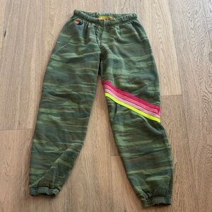 Aviator Nation Green Camo Pants with Pink and Yellow Stripes